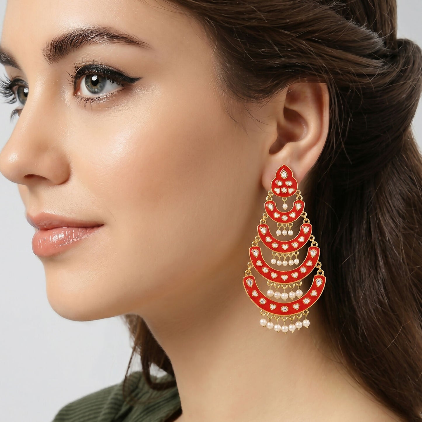 Detailed close-up of decorative stone-style work on earrings