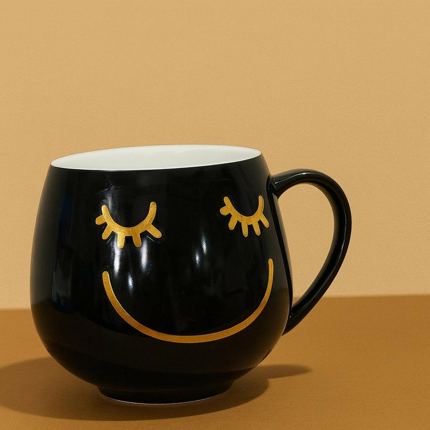 Premium Black Ceramic Coffee Mug with Golden Smile & Eyelash Design – Large Round Tea Cup for Home, Office & Gifting | Stylish Modern Aesthetic Cup | Microwave & Dishwasher Safe | Unique Smiley Face Mug 350ml