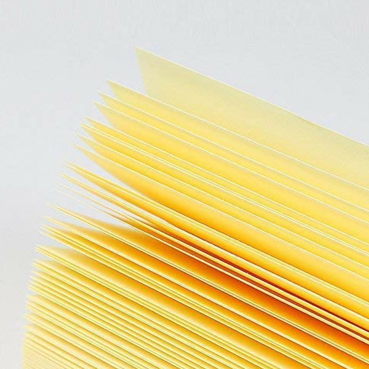 Stack of six self yellow sticky note pads each with 80 sheets