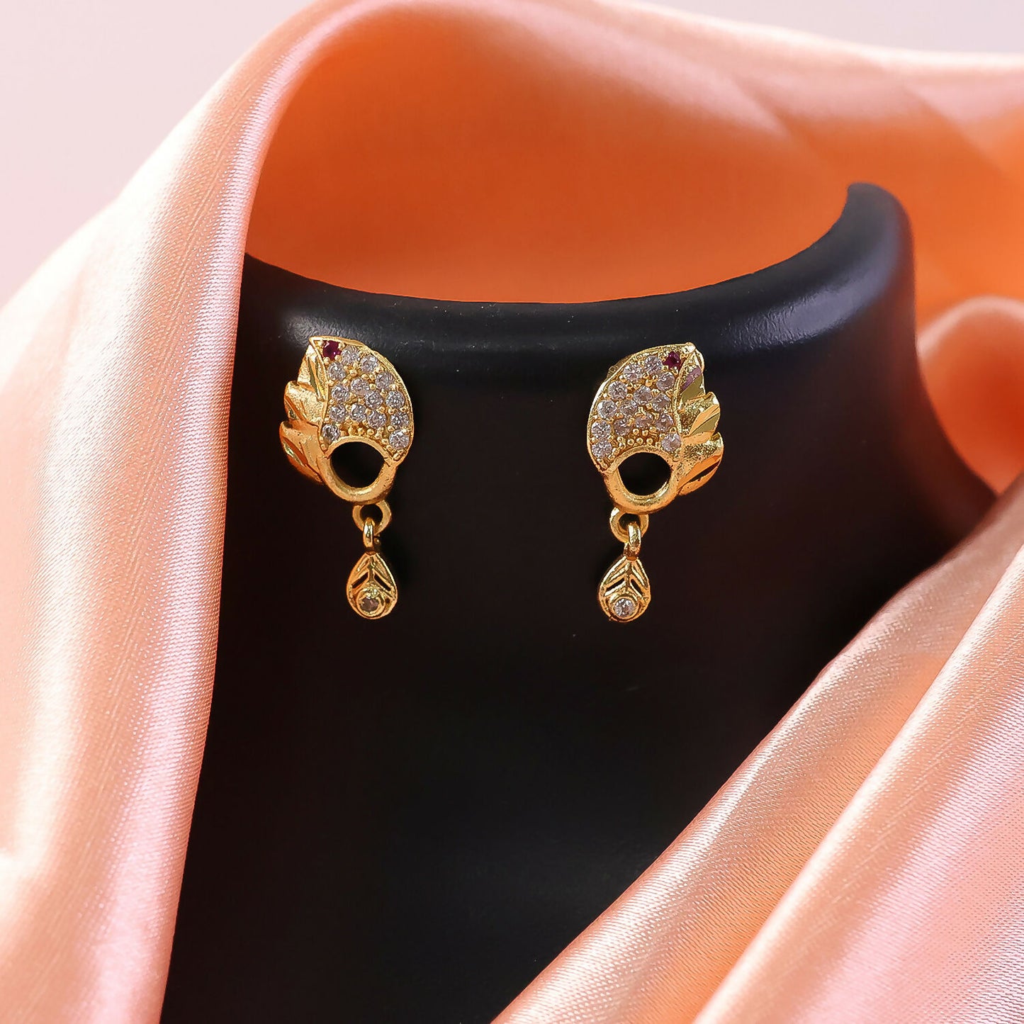 Elegant Gold Finish Leaf Pattern Stud Earrings With Sparkling Stone Drop Design