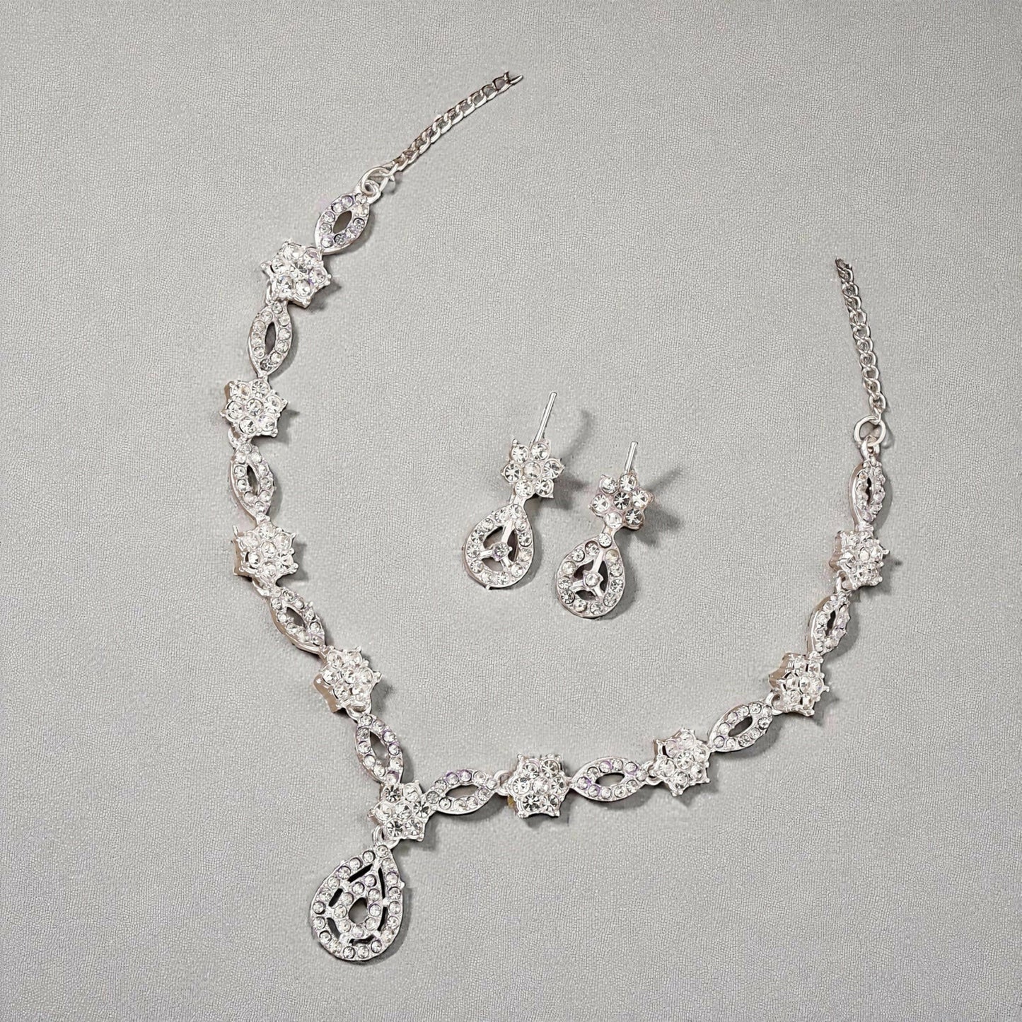 Close-up of leaf motif and pearl drop detail