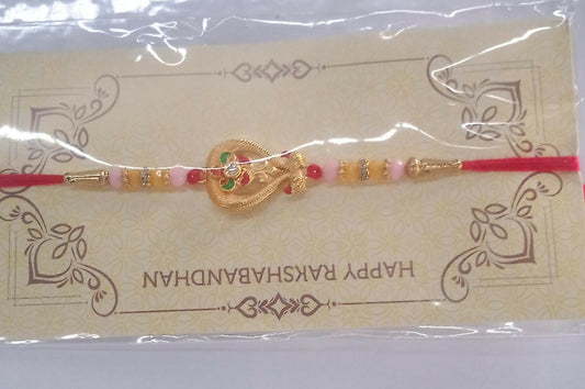 Stylish Designer Rakhi displayed elegantly on wooden surface