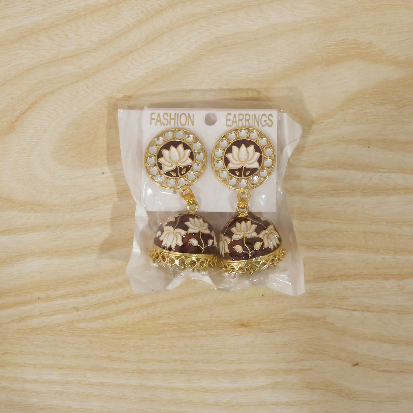 Maroon lotus design jhumka earrings worn as live model photo