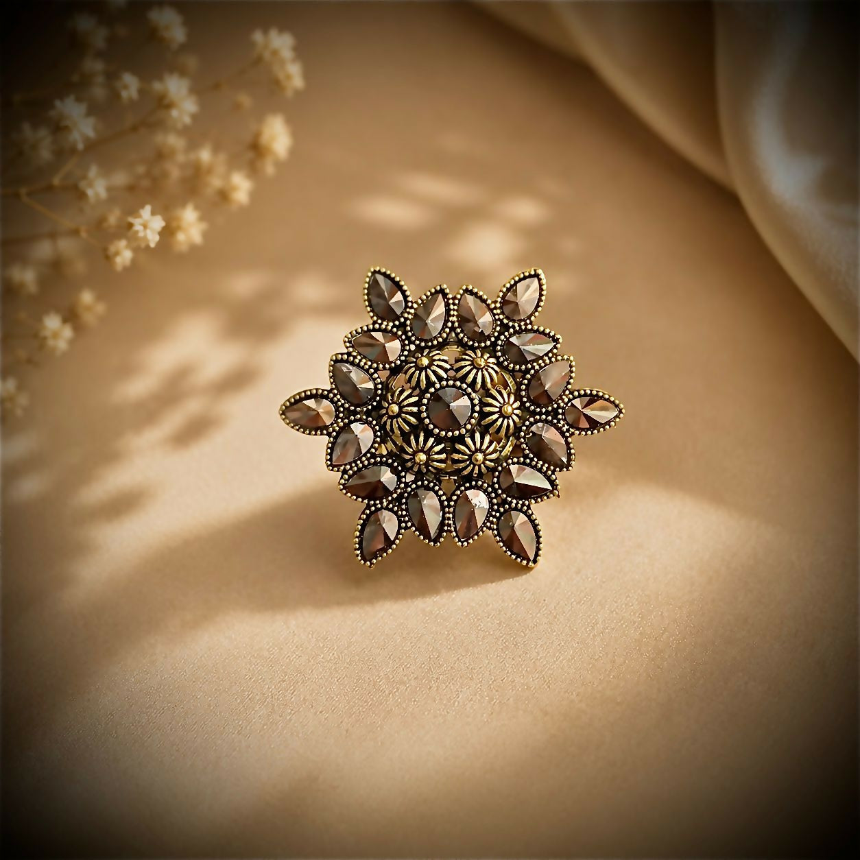 Model showcasing the elegant Vintage Floral Statement Ring on her hand.