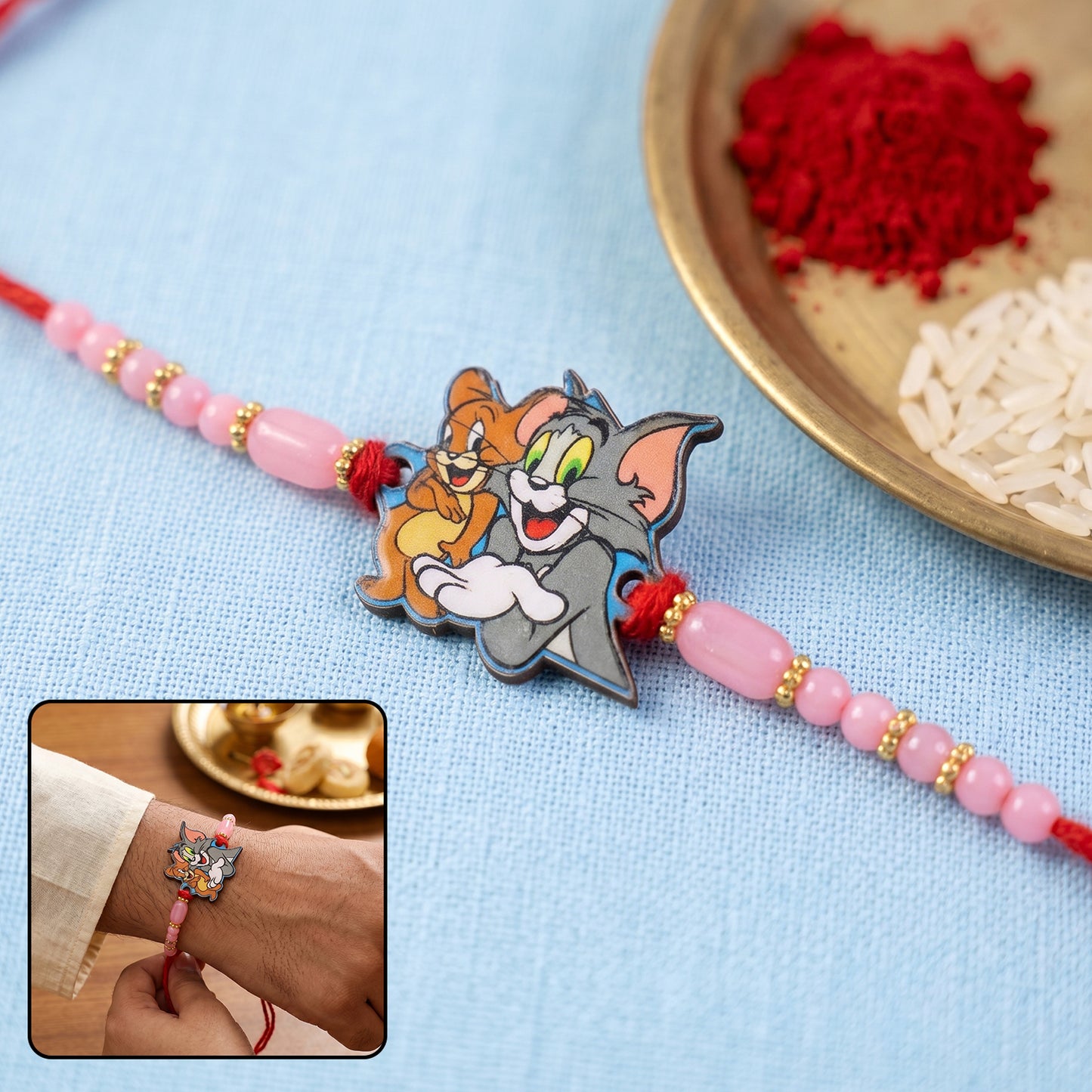 Cartoon Kids Rakhi with Pink Beads and Gold Accents