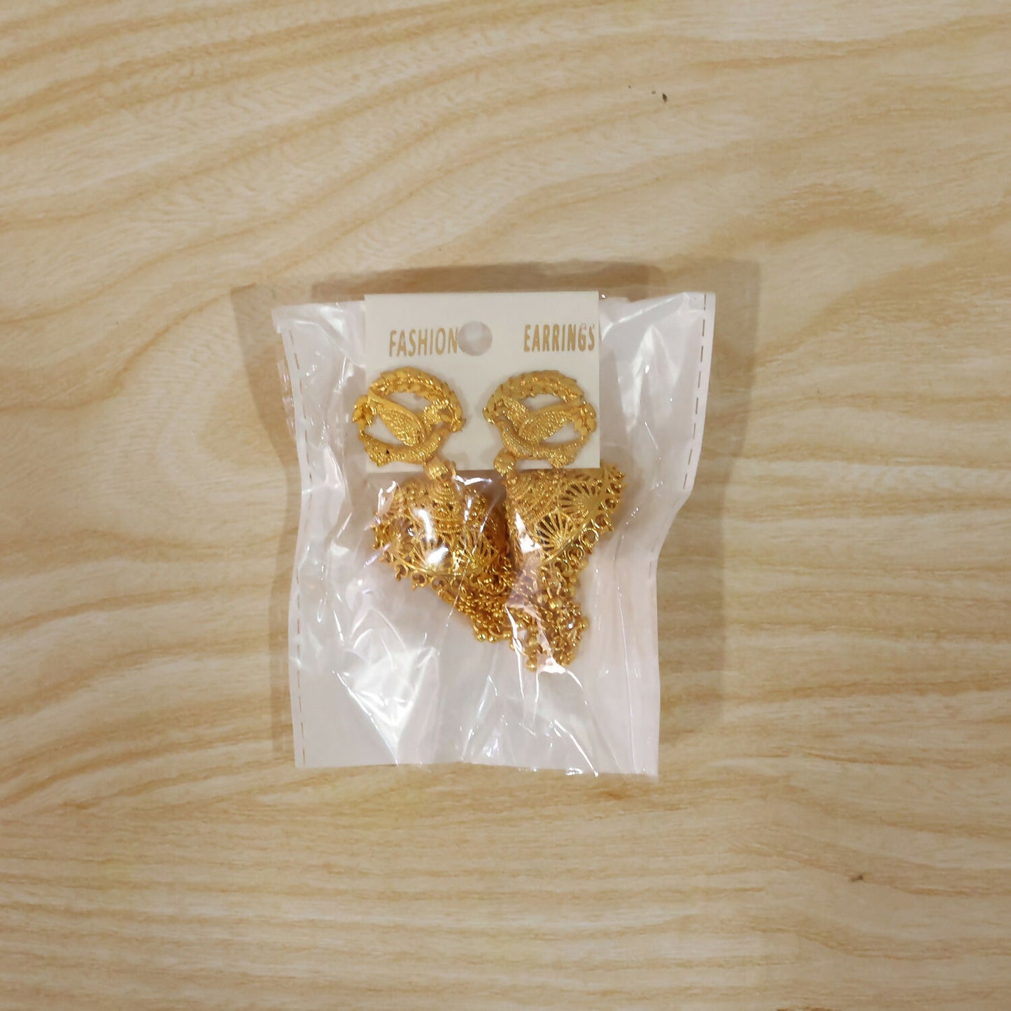 Golden Leaf Tassel Jhumka Earrings worn look
