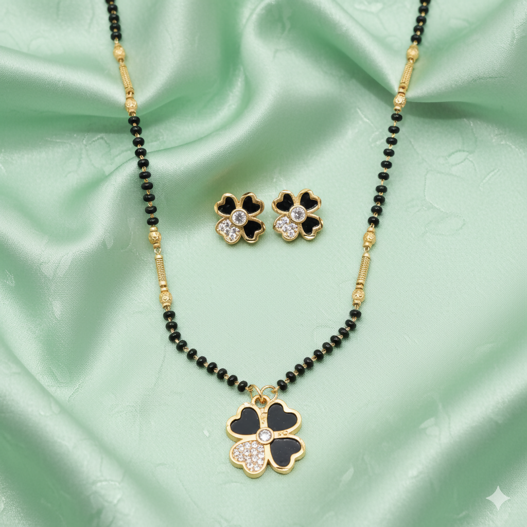 Gold-plated black clover mangalsutra pendant with intricate stone detailing
