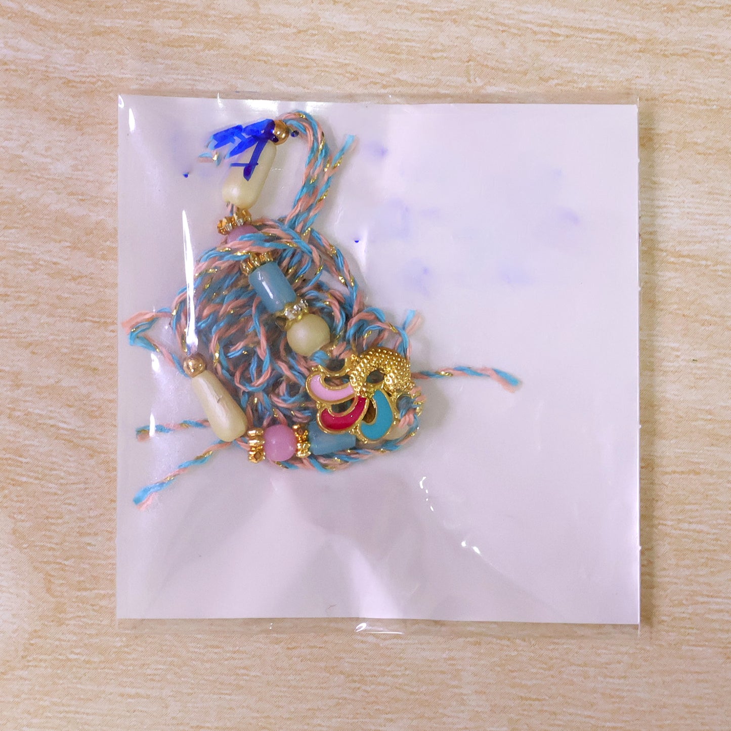 Colorful Enamel Bird Pendant Rakhi with Pastel Beads