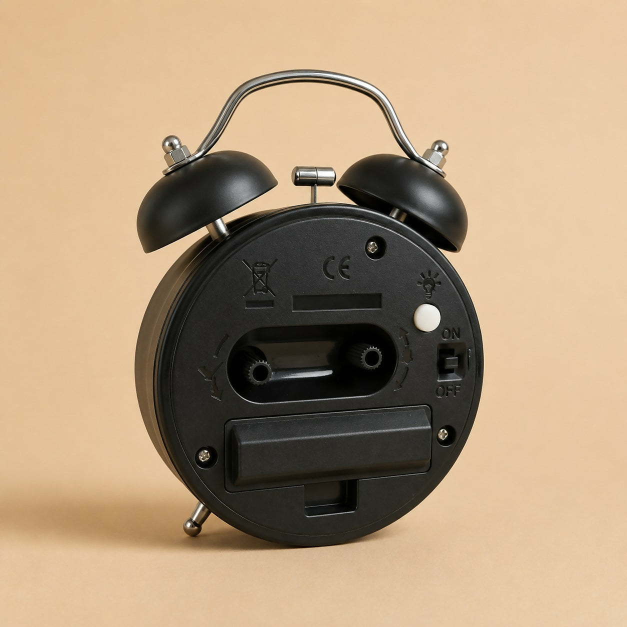 Close-up of analog dial on classic twin bell alarm clock