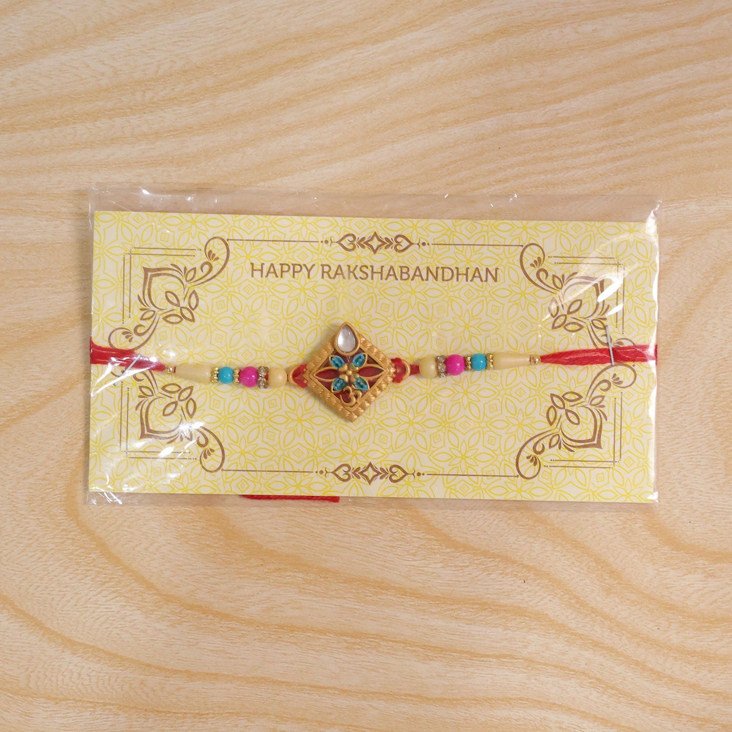 Diamond Shape Rakhi with Stone Embellishments and Beads (10pcs)