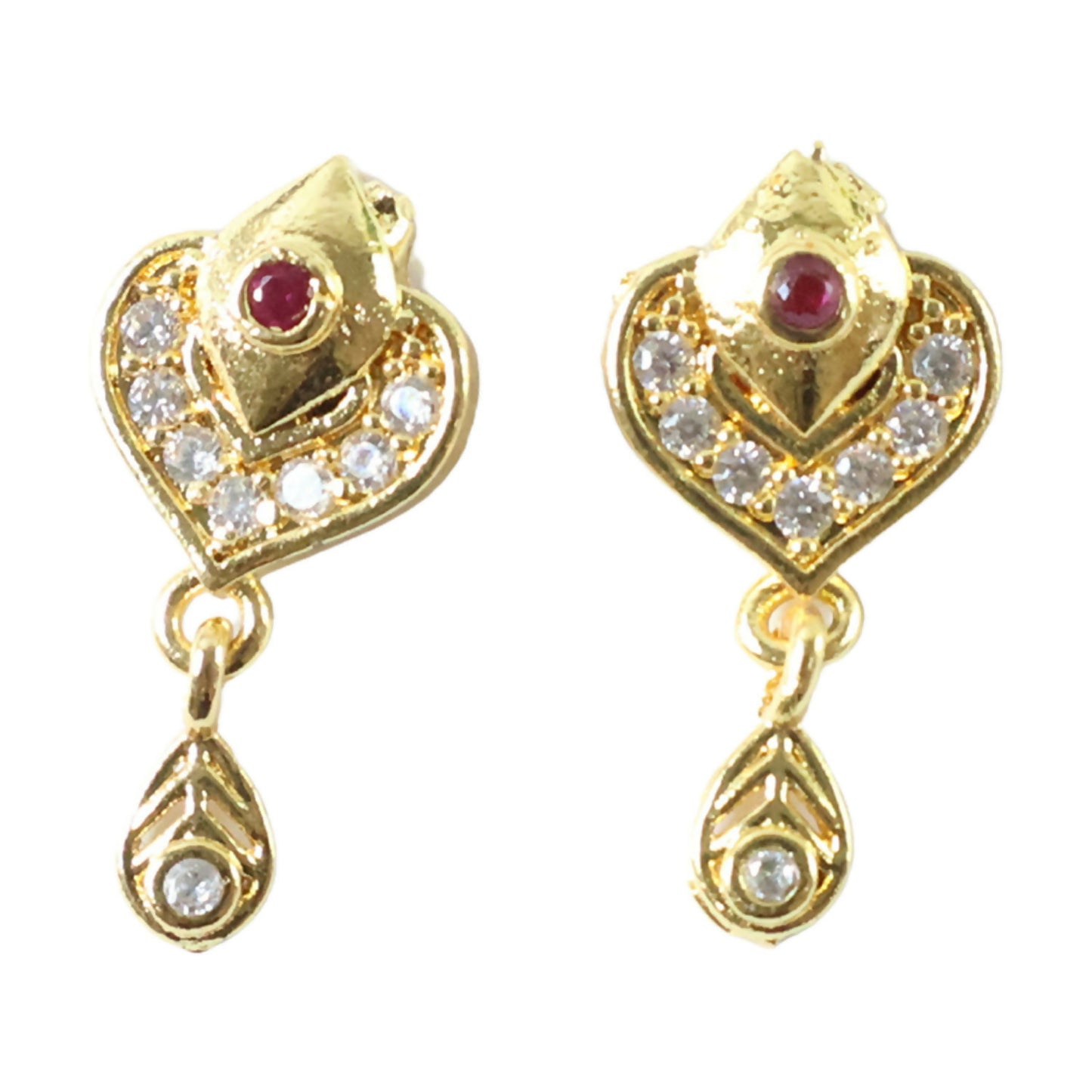 Ruby and Crystal accented gold heart earrings on warm background