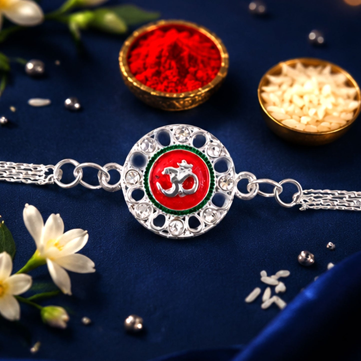 Om Rakhi Silver Plated with Red Enamel – Elegant Protection Thread