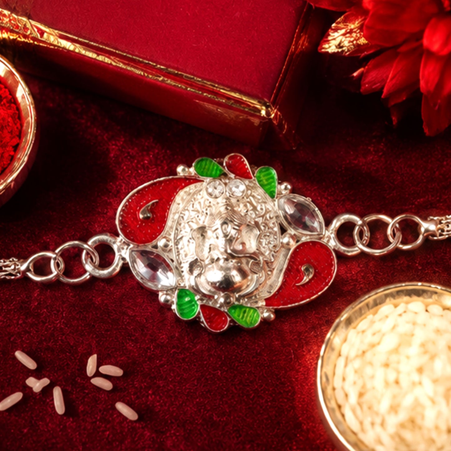 The Ganesha Rakhi presented alongside traditional festive elements, highlighting its auspicious appeal.