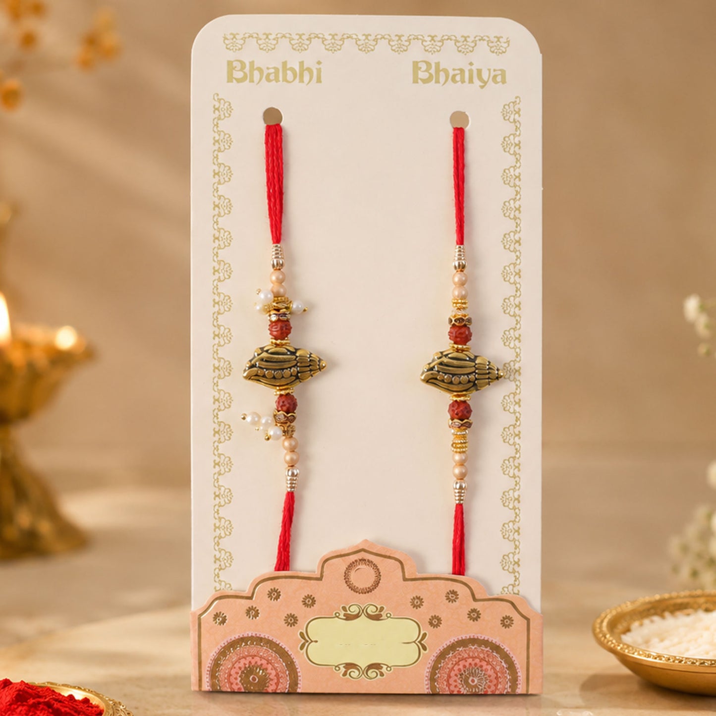 Antique Paisley Couple Rakhi Set with Rudraksha Beads and Pearl Lumba Charm Design