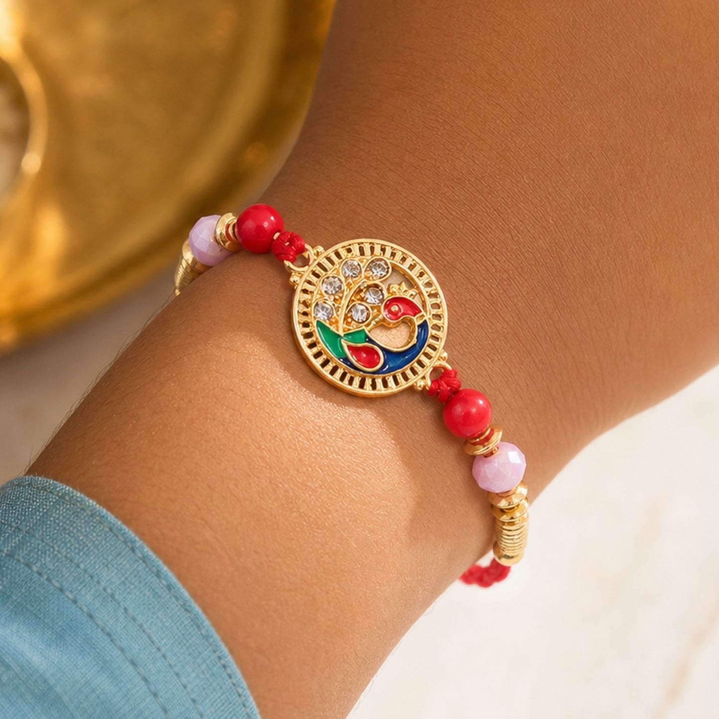 Premium Round Peacock Rakhi with Pearl Beads and Sacred Charm Design (5pcs)