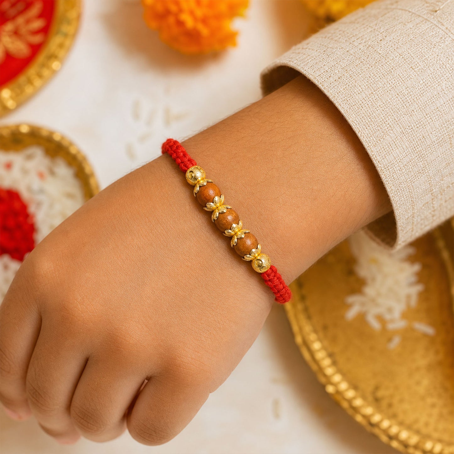 Red Braided Rakhi with Natural Wooden Bead Pendant Accents