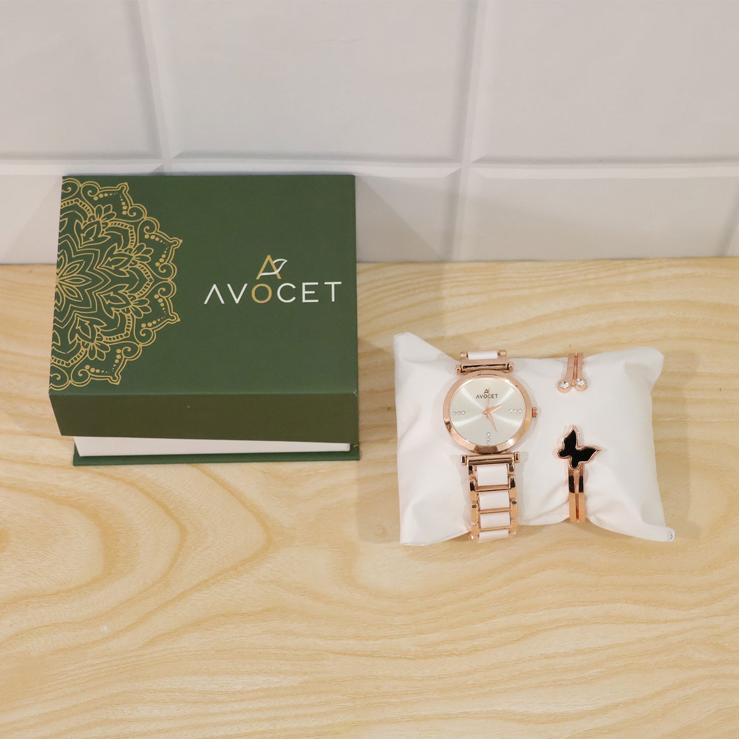 Rose Gold Round Dial Watch with Black Butterfly Charm Bracelet for Women