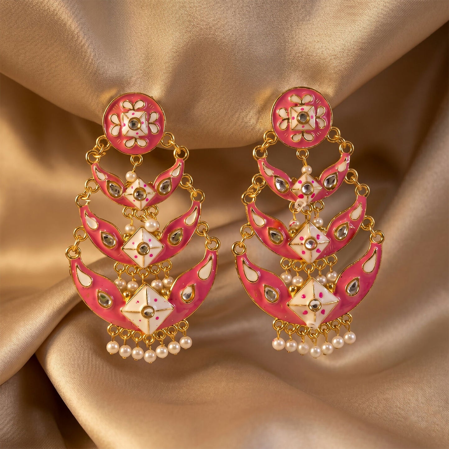 Side view of pink ethnic chandbali earrings showing layered crescent design