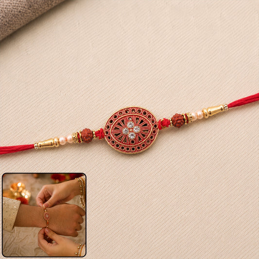 Round Red Chakra Rakhi with Golden Beads and Pearl Side Work