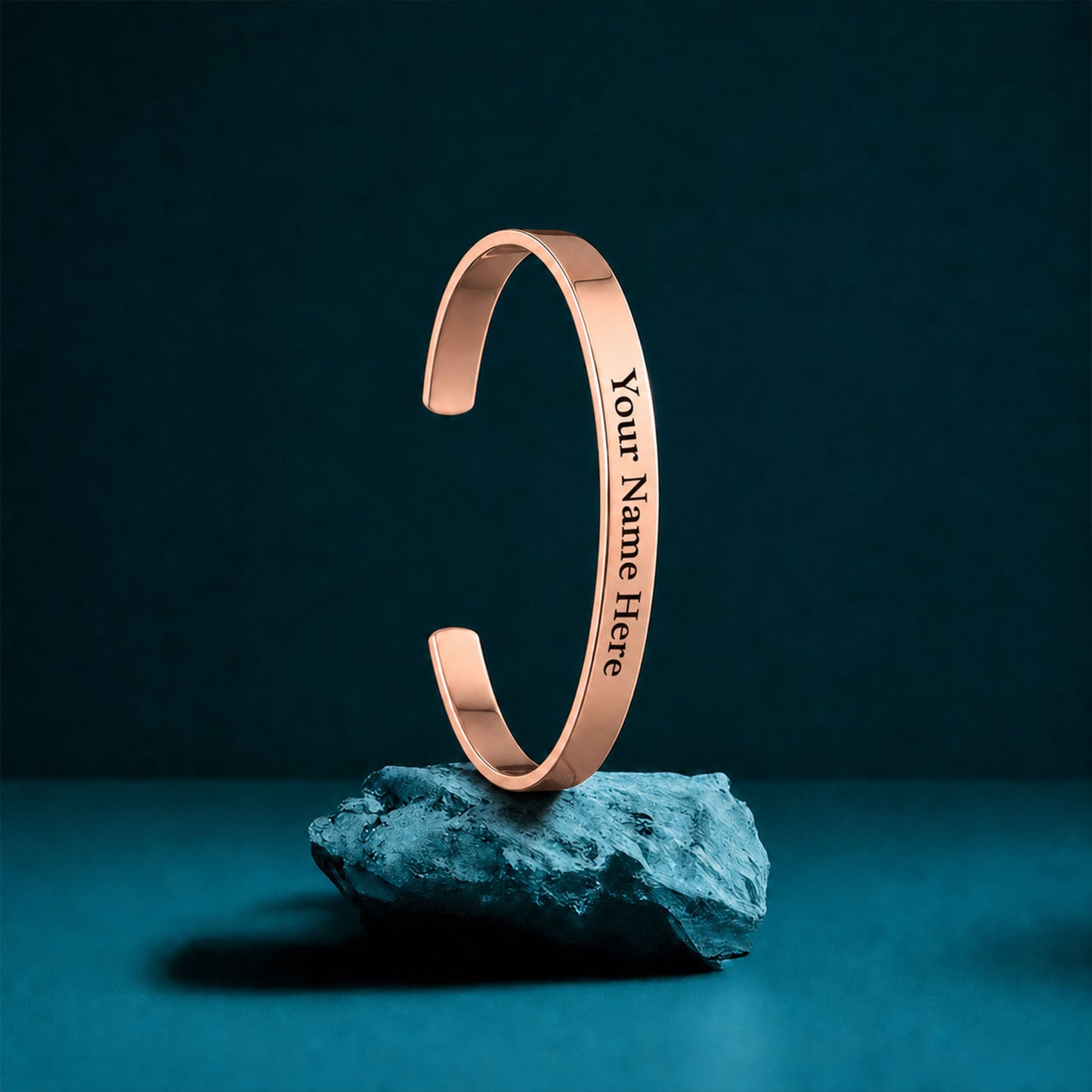 Close up of custom engraved rose gold kada for men.