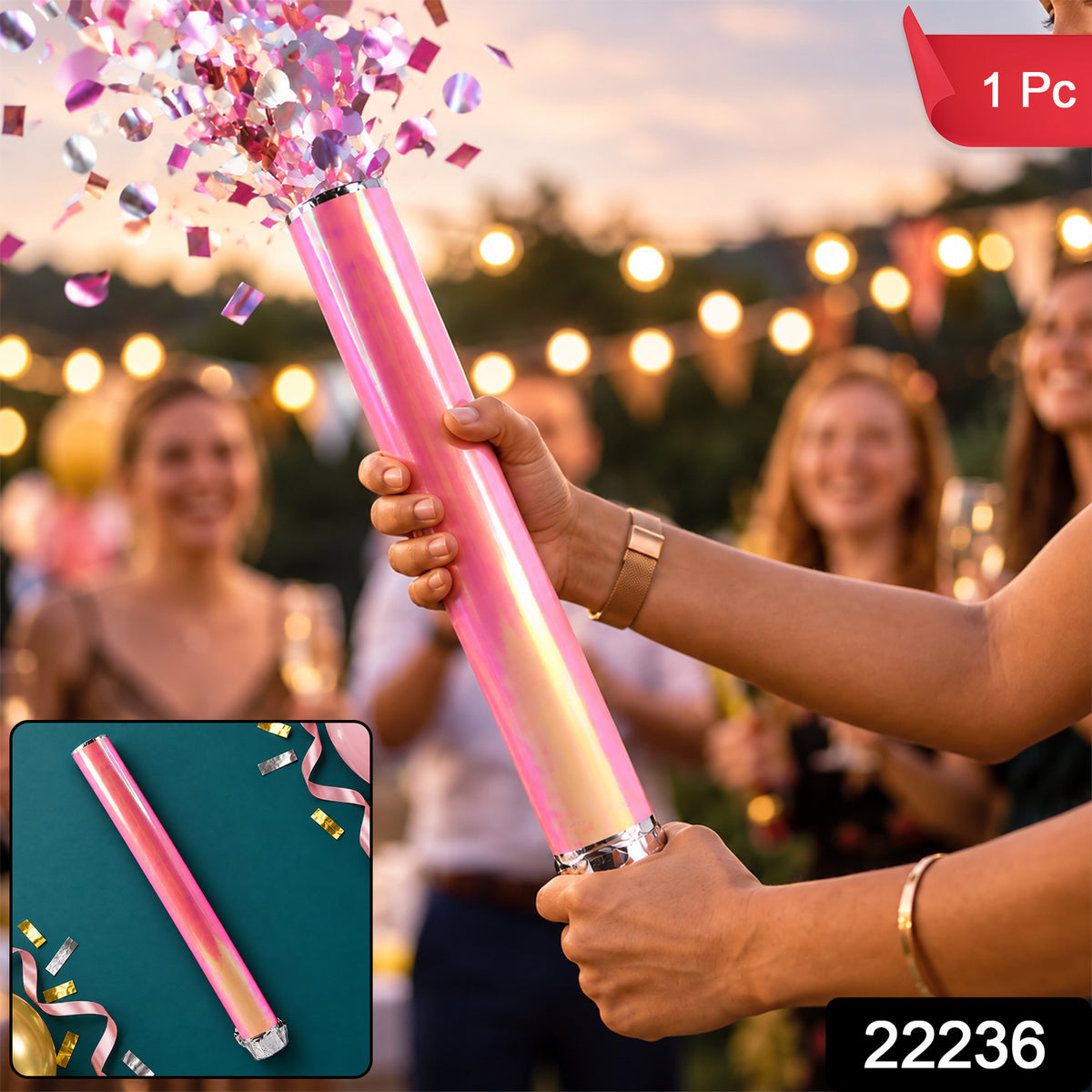 Close-up of red chamki confetti party popper.