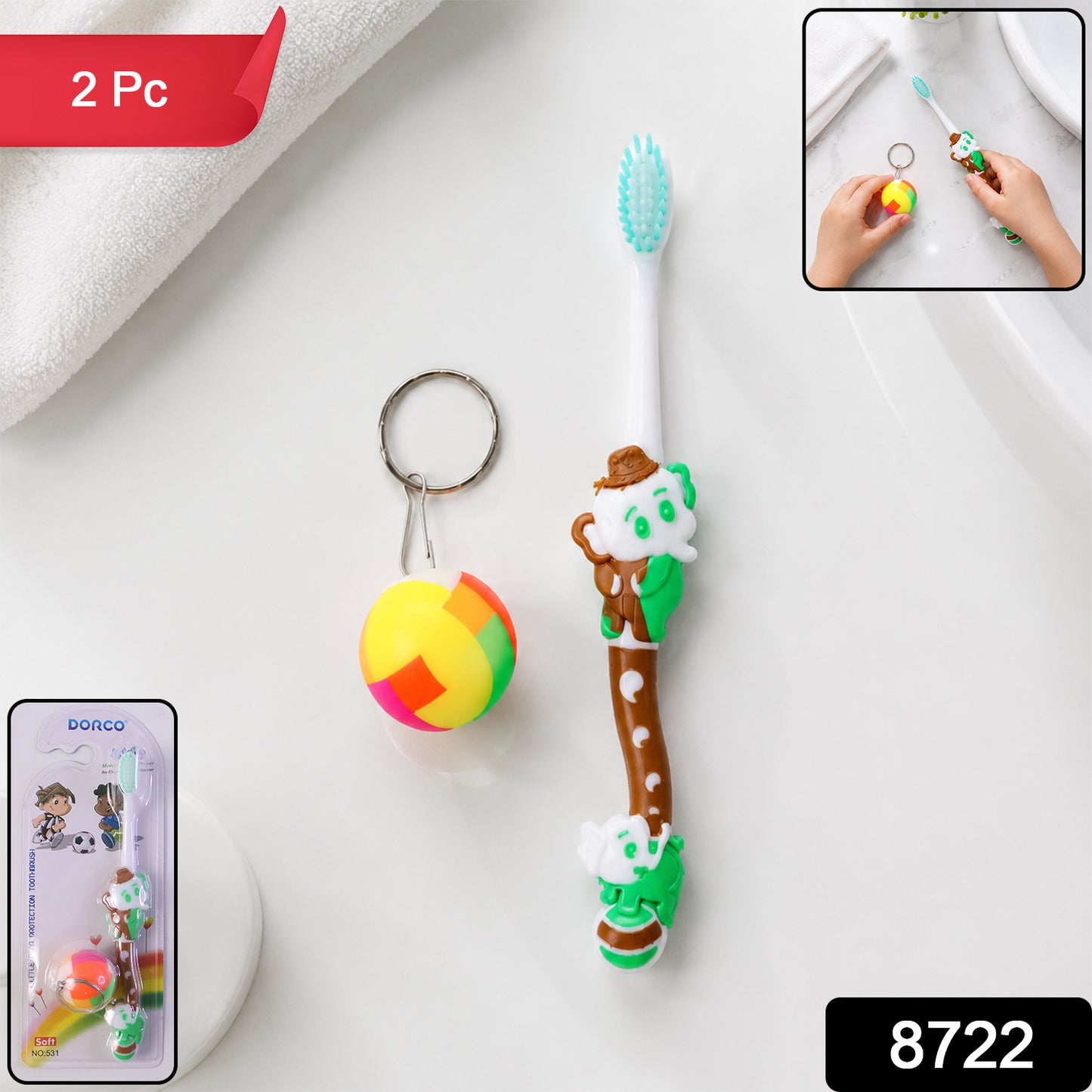 Close-up of kids toothbrush with small ball toy