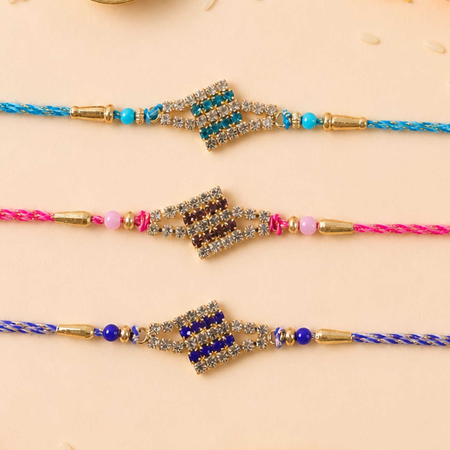 Layered Diamond Motif Rakhi in Mix Colour Threads (Pack of 6)