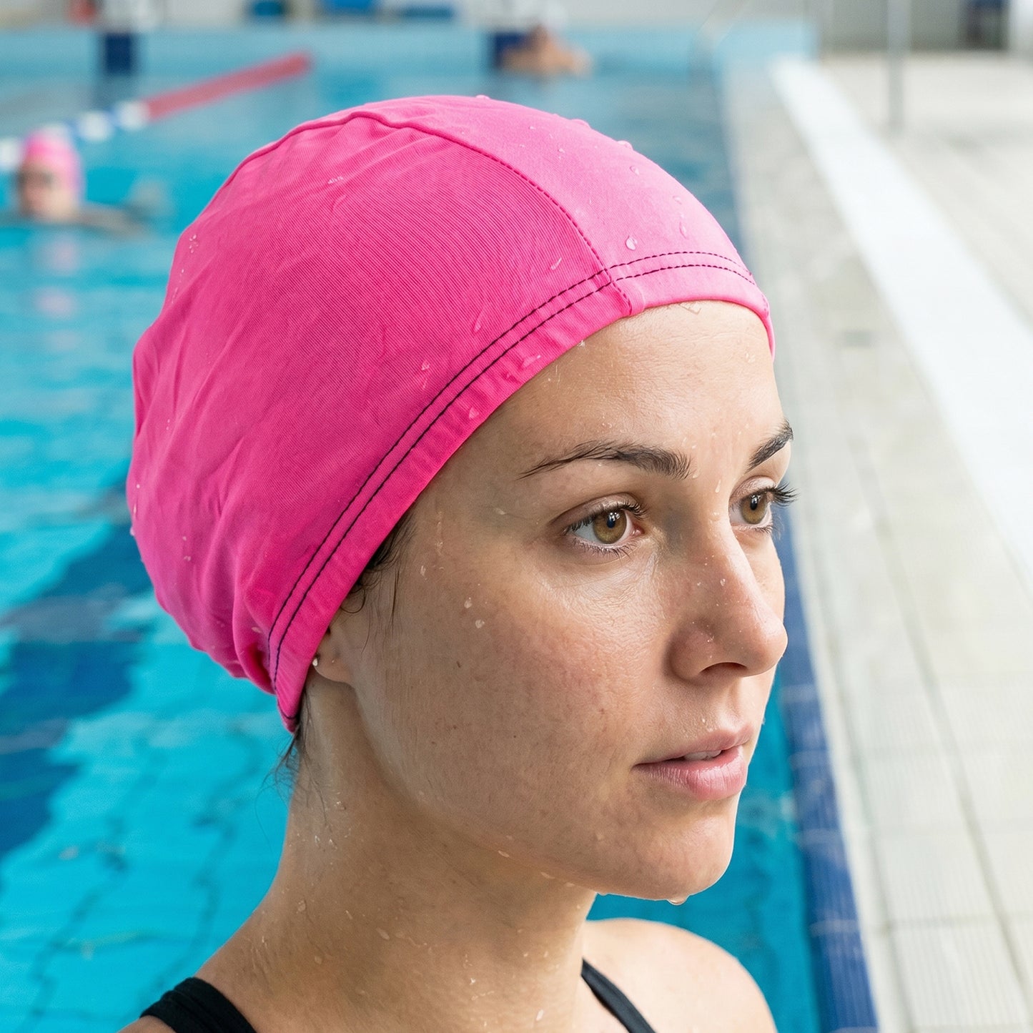 Flexible pink swimming cap