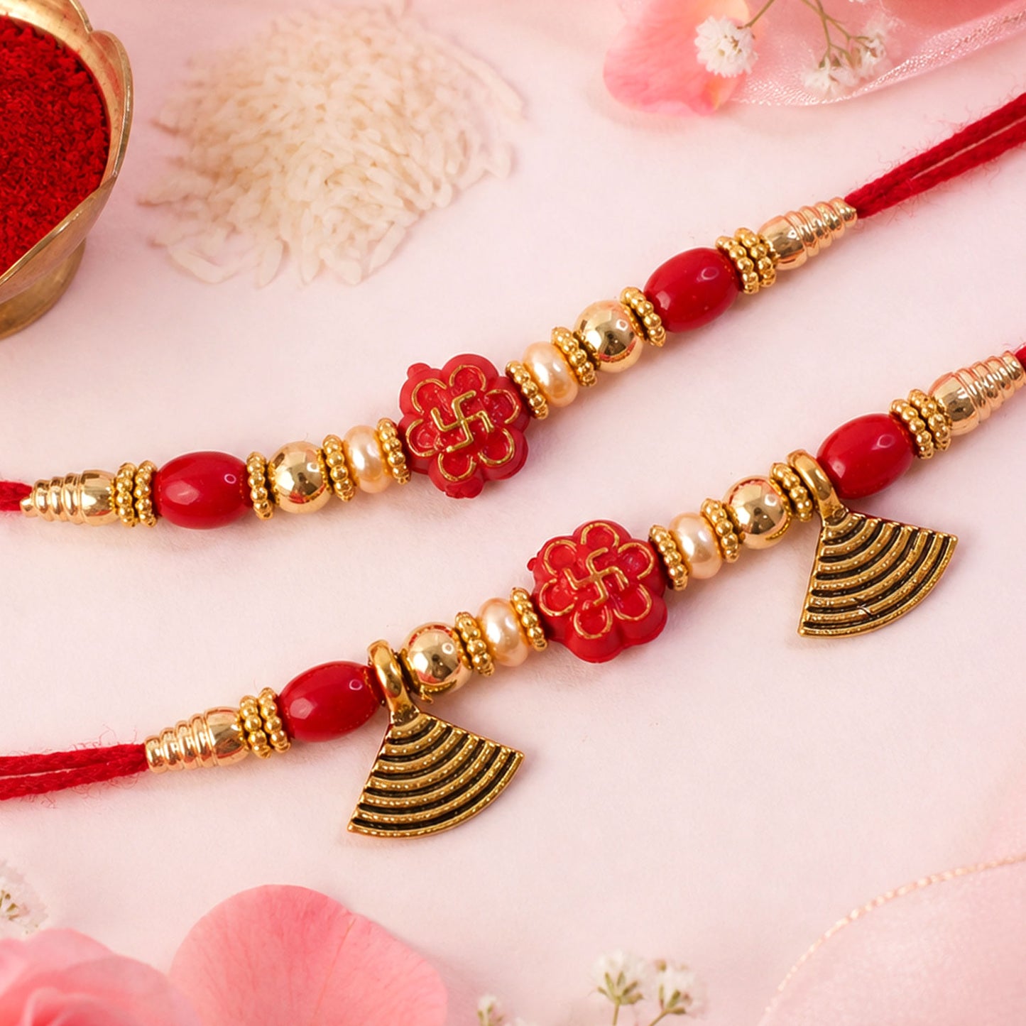 Bhai Bhabhi Floral Charm Rakhi Set with Red Thread, Gold Beads and Black Fan Drops