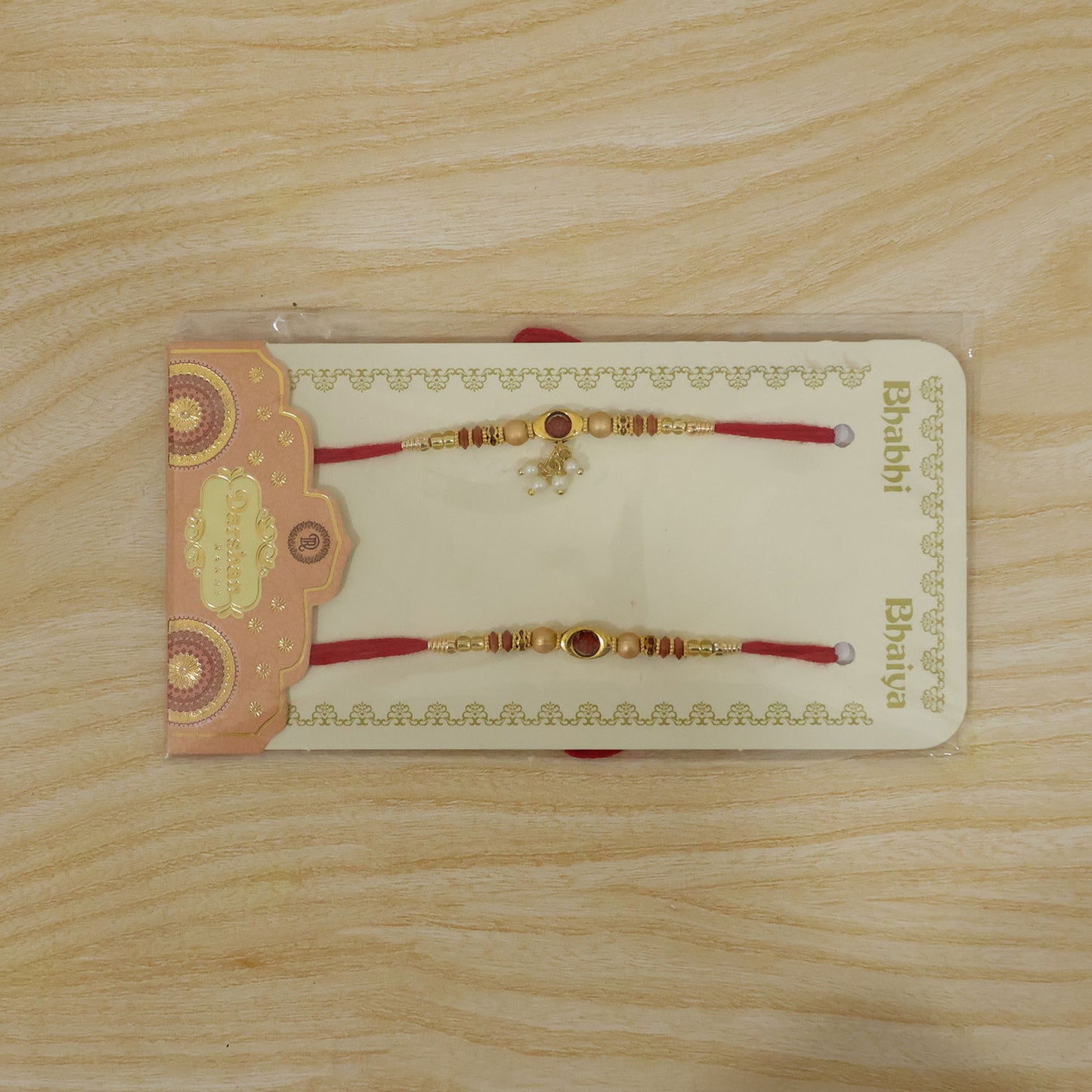 Elegant Pearl Drop Bhaiya Bhabhi Rakhi Set with Designer Beads & Red Thread Gift