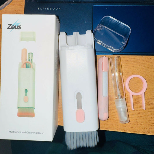 Portable pink 7-in-1 cleaning kit for keyboards and earbuds