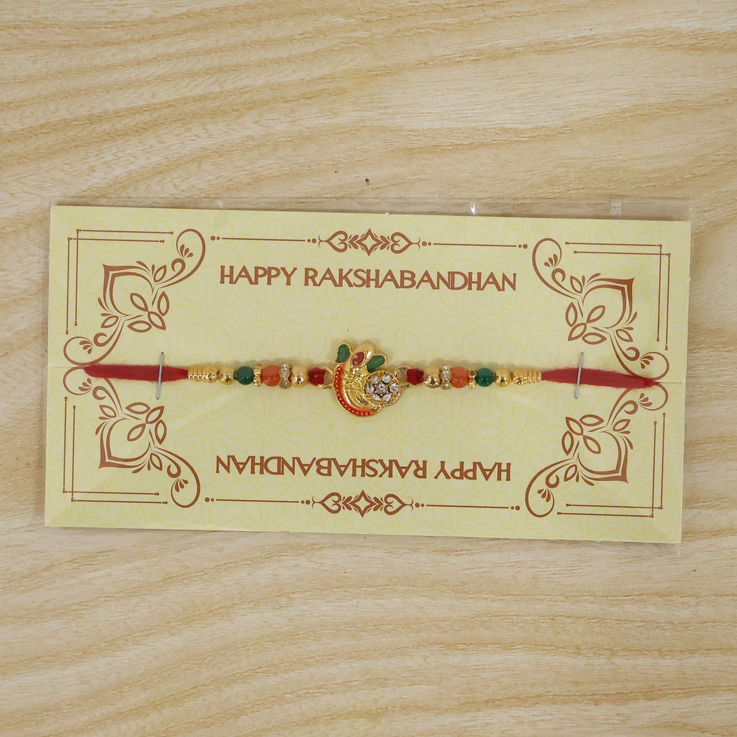 Om Rakhi for Brother Traditional Multicolor Beads on Red Thread (10pcs)