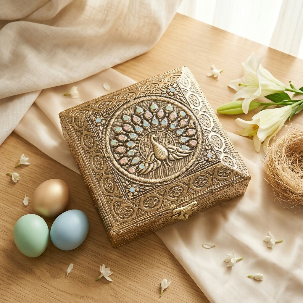 Close-up of peacock embossed lid on jewelry box