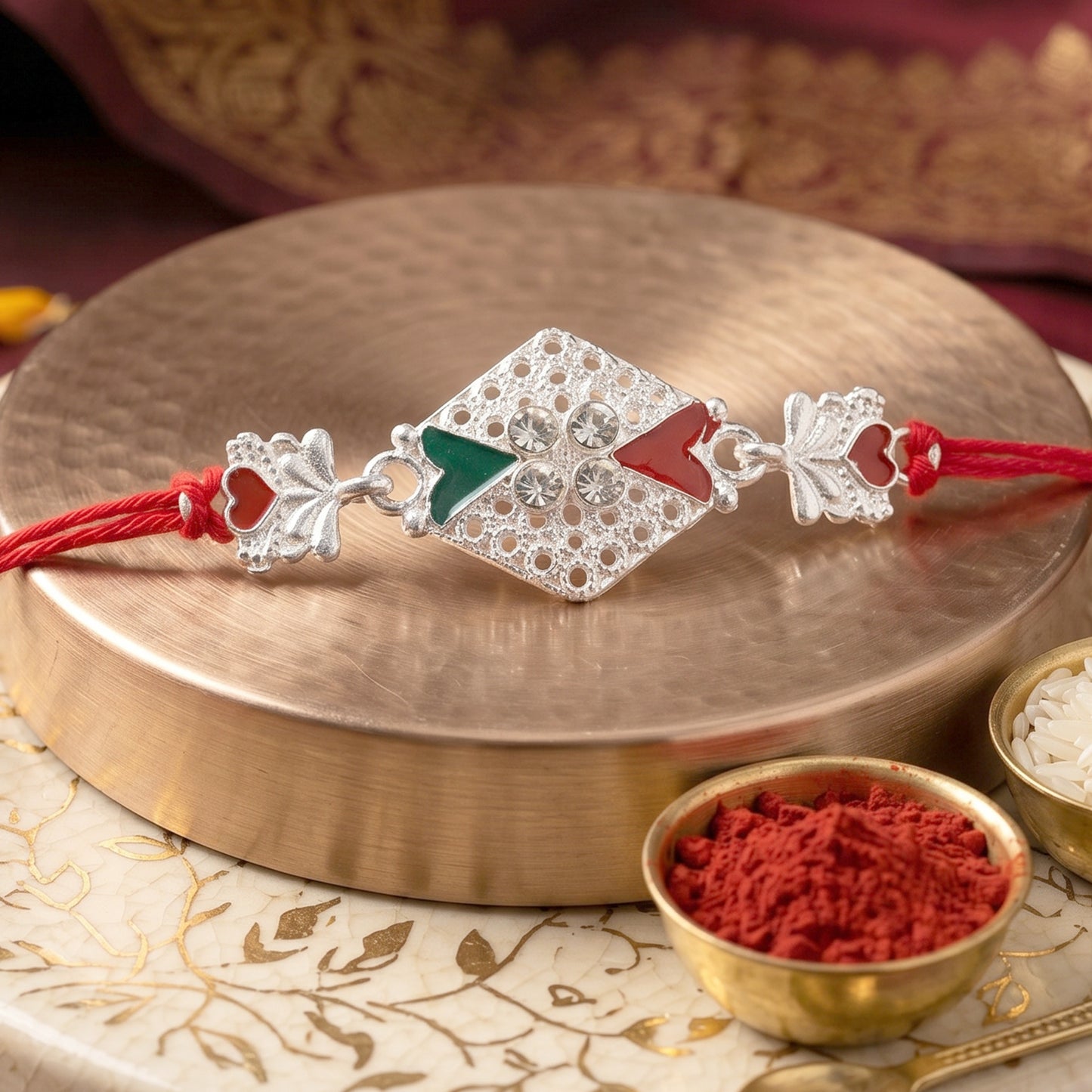 Silver Elephant Charm Rakhi with Red Green Stones and Crystals