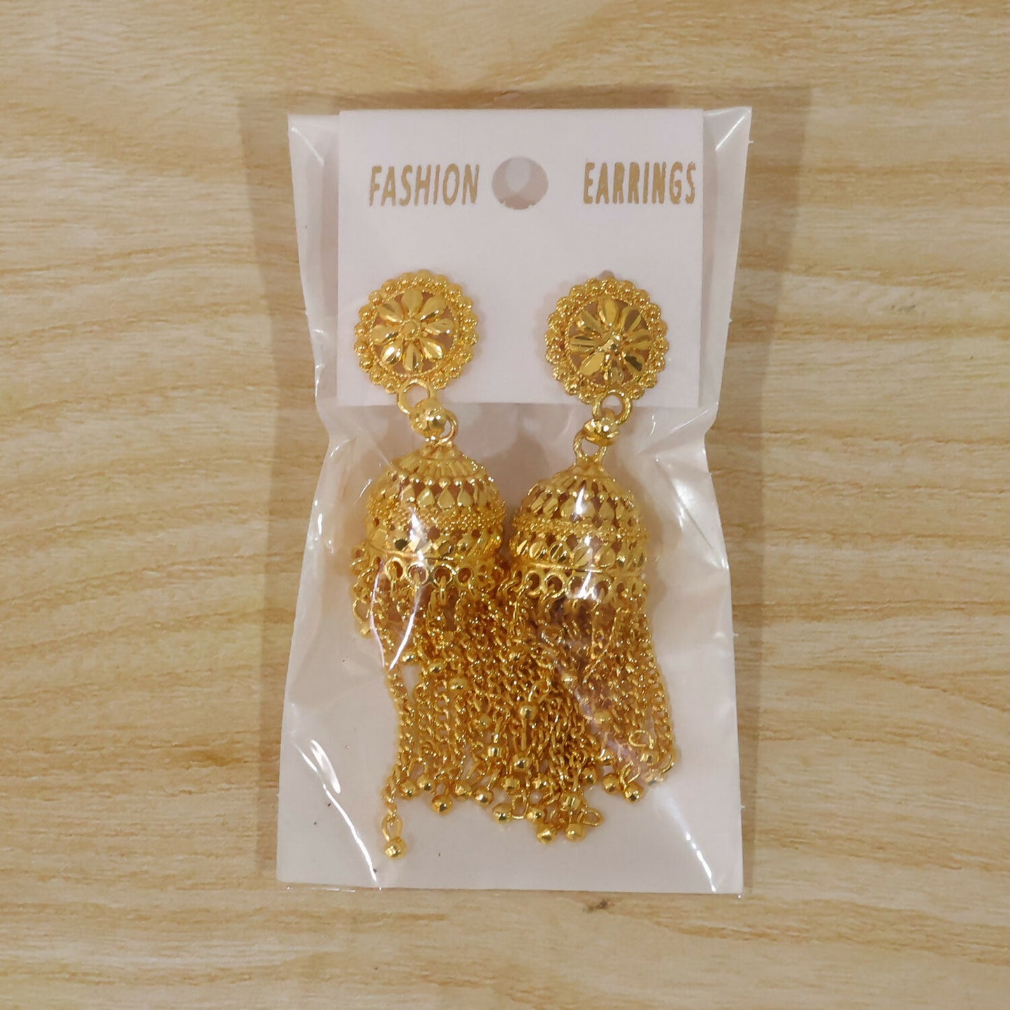 Elegant golden jhumka earrings showcasing craftsmanship