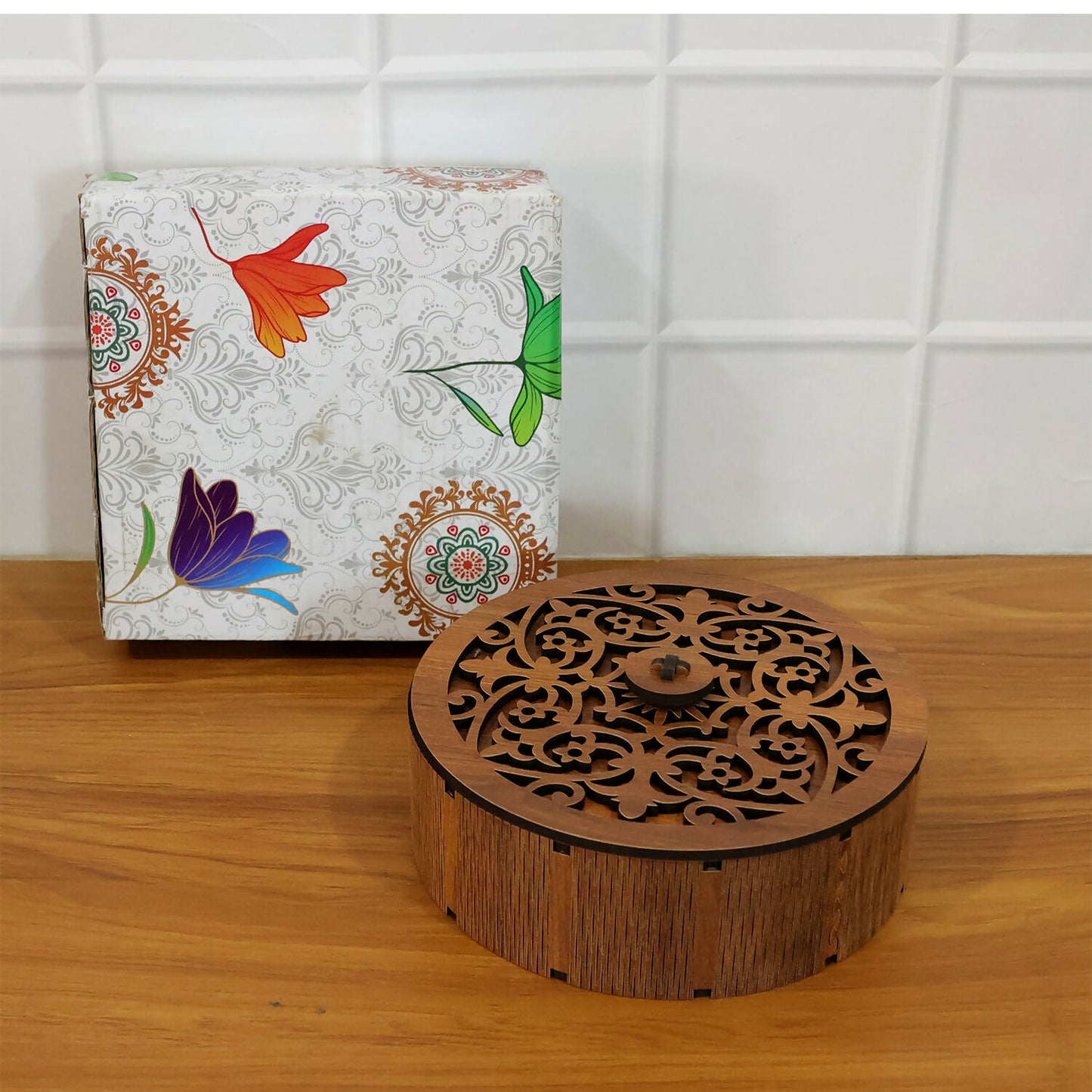 Dry fruit storage box placed on dining table enhancing festive home décor
