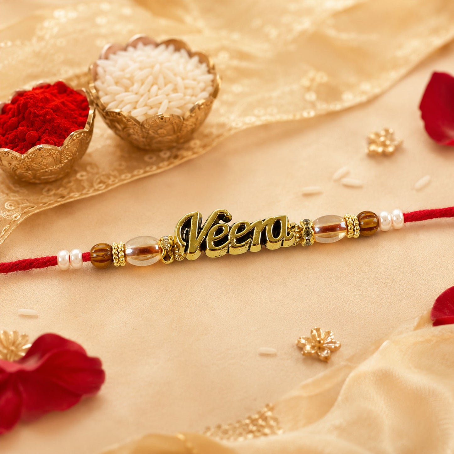 Veera Name Golden Rakhi with White Brown Beads, Red Thread and Premium Finish