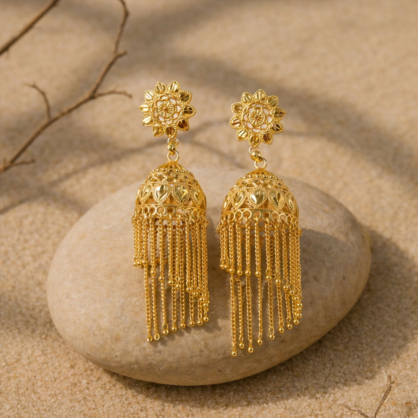Traditional Gold Tone Floral Jhumka Earrings with Long Chain Tassel Design