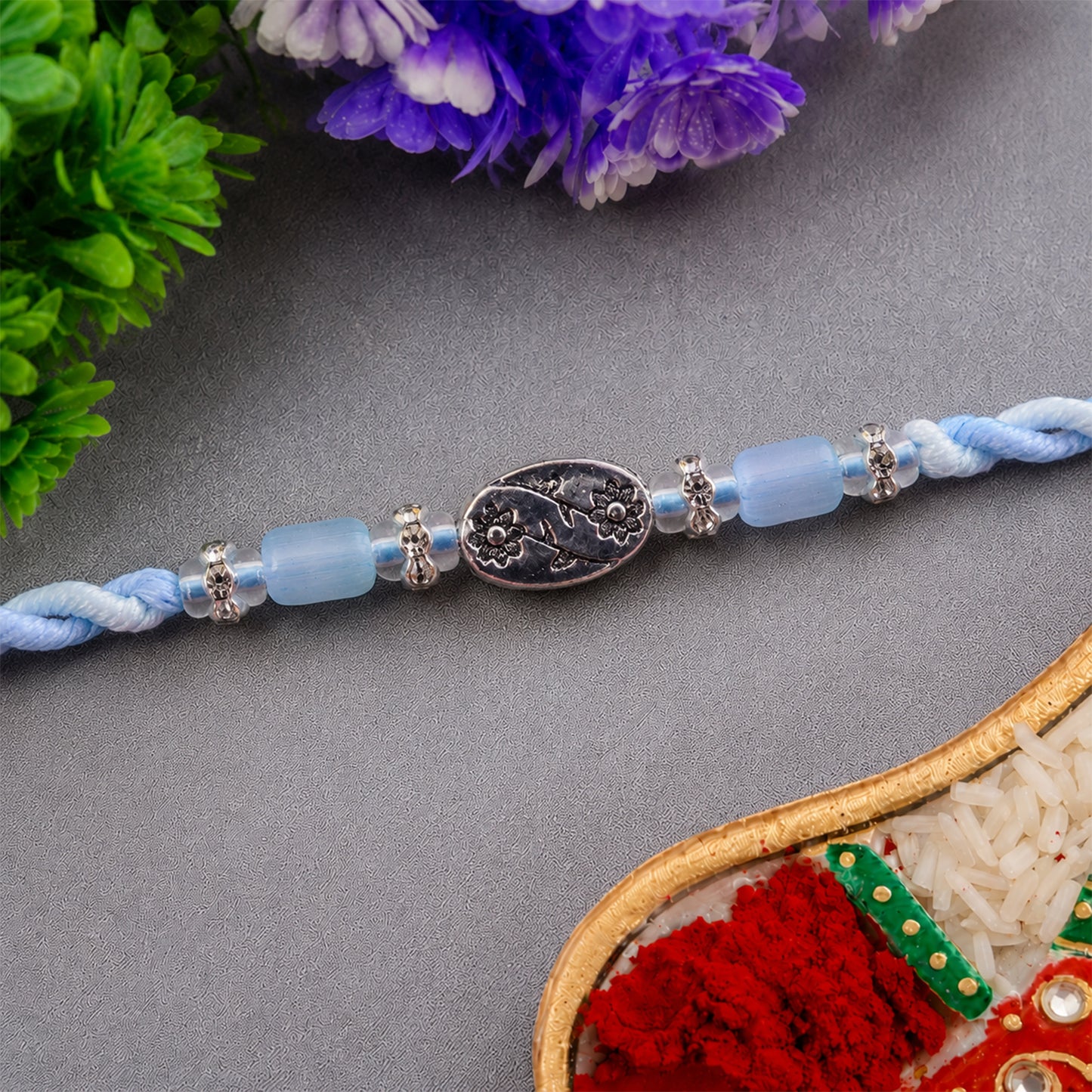 Blue Silver Stone Rakhi with Elegant Bracelet Style and Premium Festive Shine