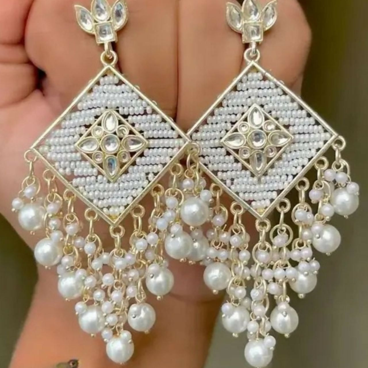 Traditional Kundan Stud Earrings with White Seed Bead Work and Pearl Drops.
