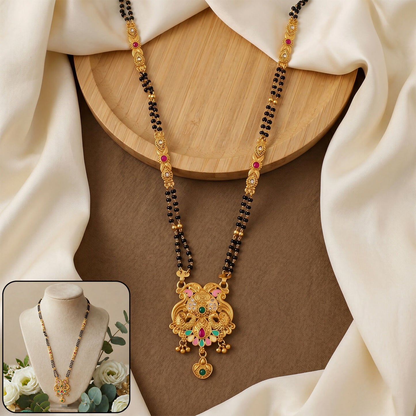 Close-up of antique finish Makara dragon scroll pendant with fan enamel base on mangalsutra chain