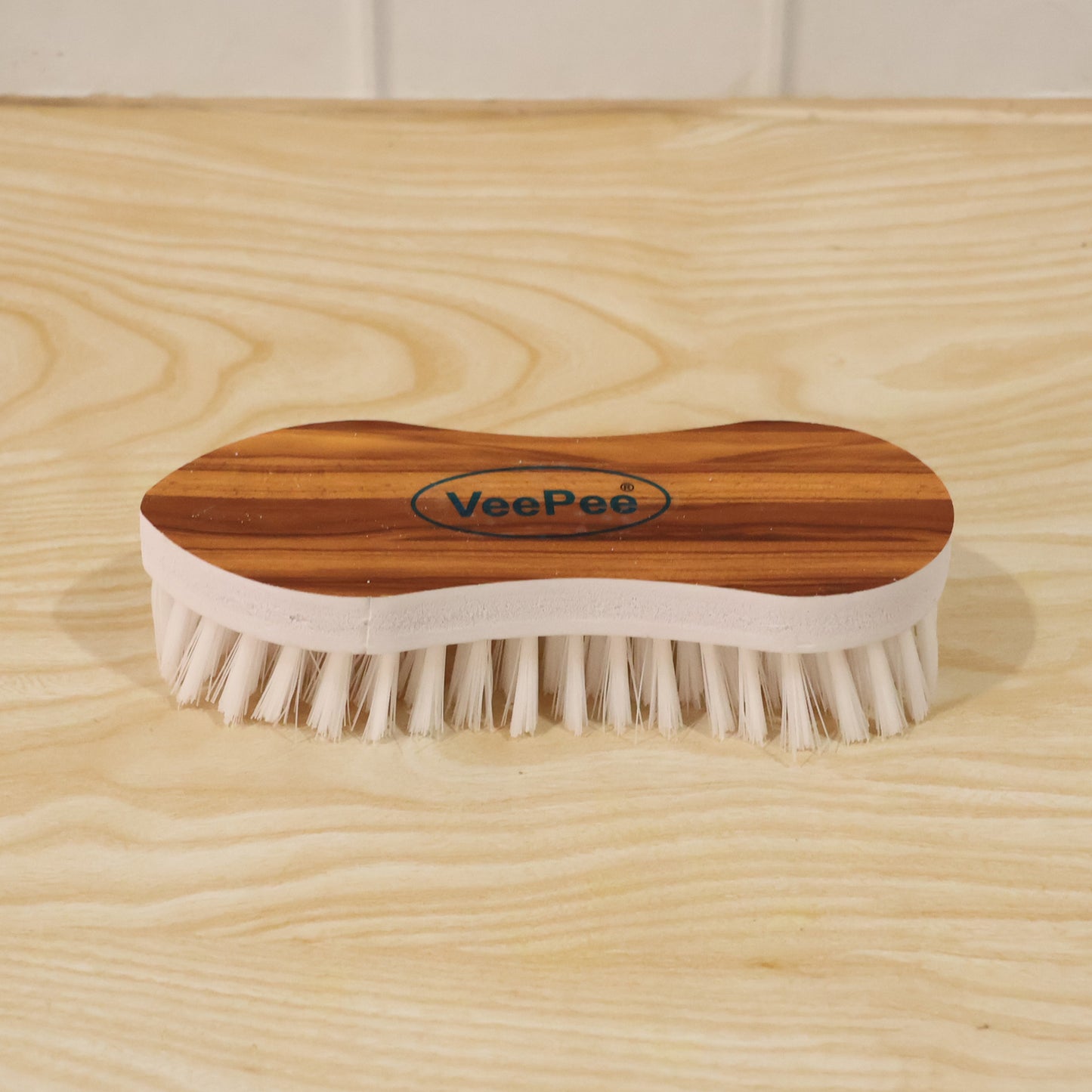 Cloth Washing Brush on wooden background