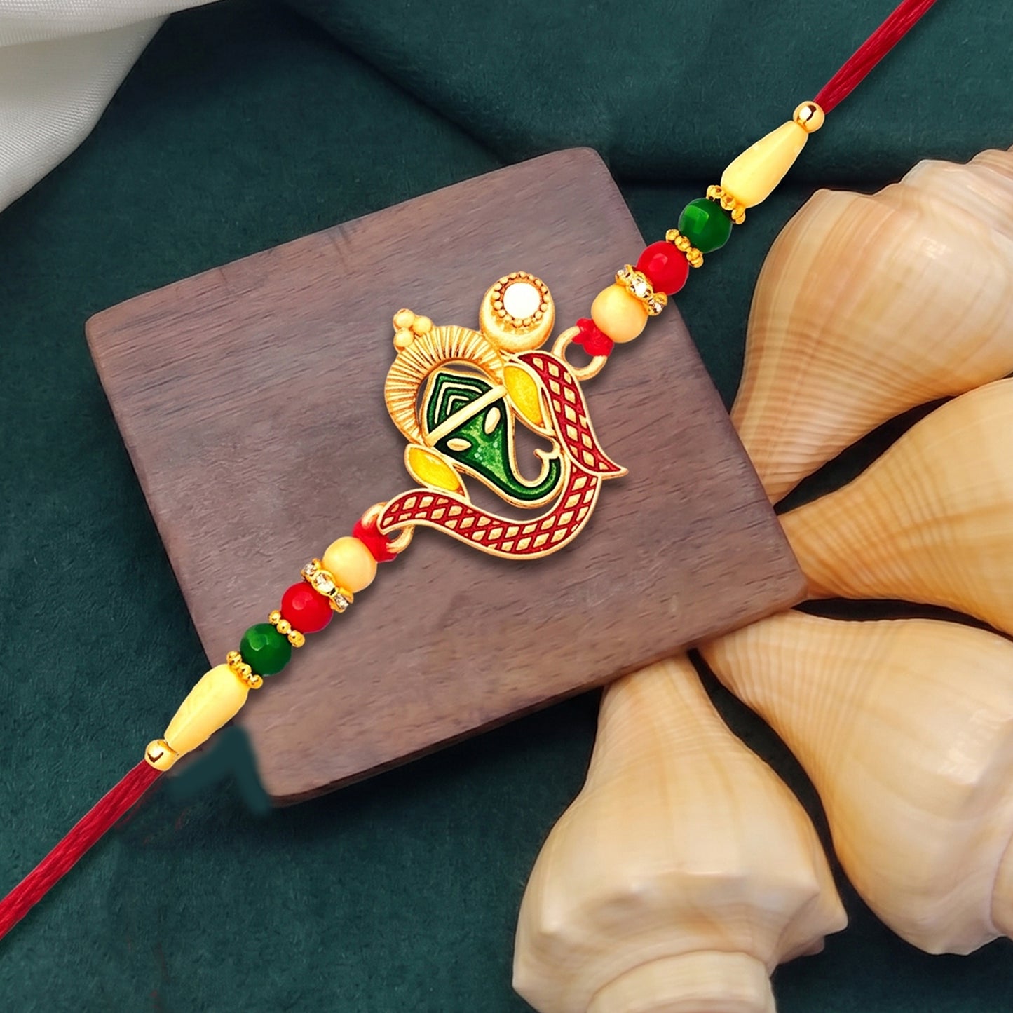 Ganpati Rakhi handcrafted with traditional design and premium materials