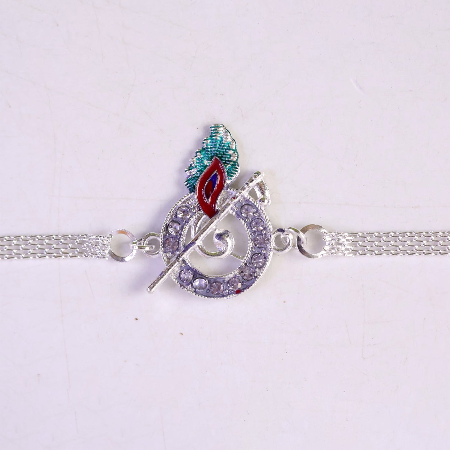 Krishna Morpankh Bansuri Stone-Studded Chain Rakhi for Brother