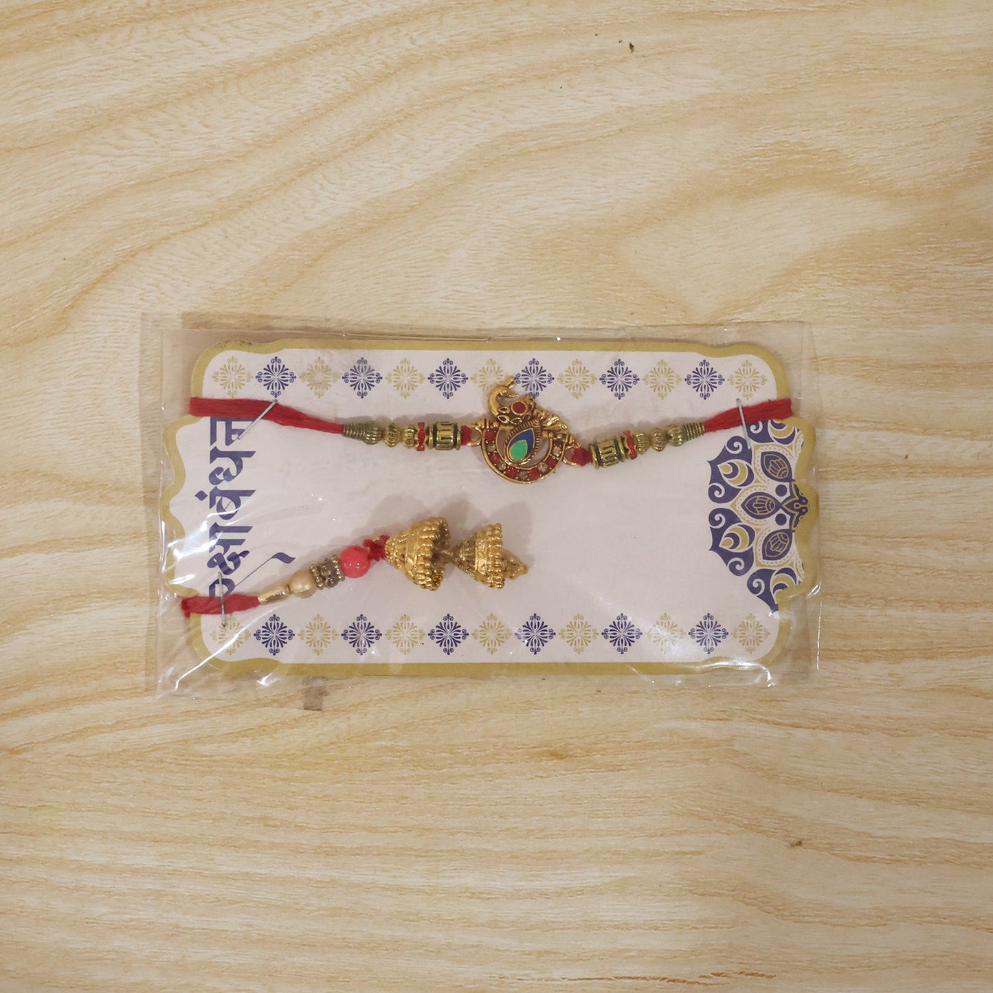 Peacock Pendant Bhabhi Rakhi side angle with Jhumka Latkan