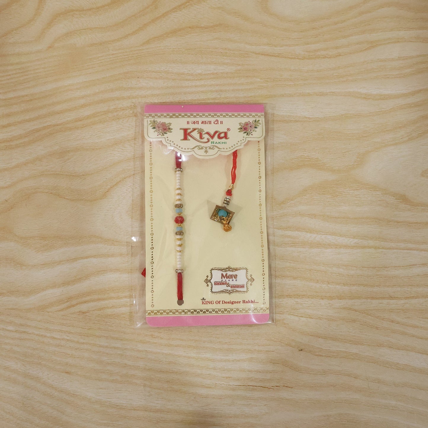 Detailed bead work on Bhabhi Rakhi with elegant latkan