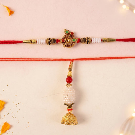 Pearl Peacock Bhabhi Rakhi with golden tassel on white background