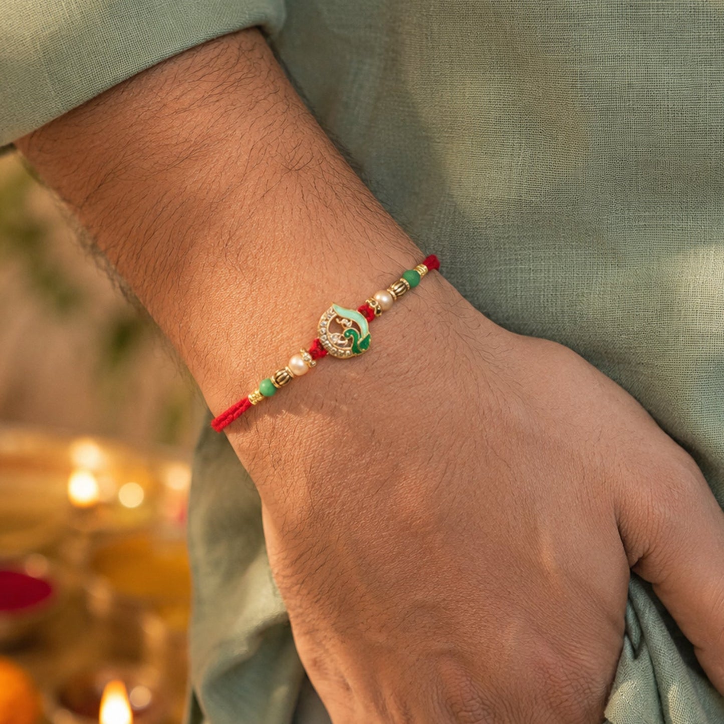 Close-up of pearl drop on Peacock Stone Bhabhi Rakhi