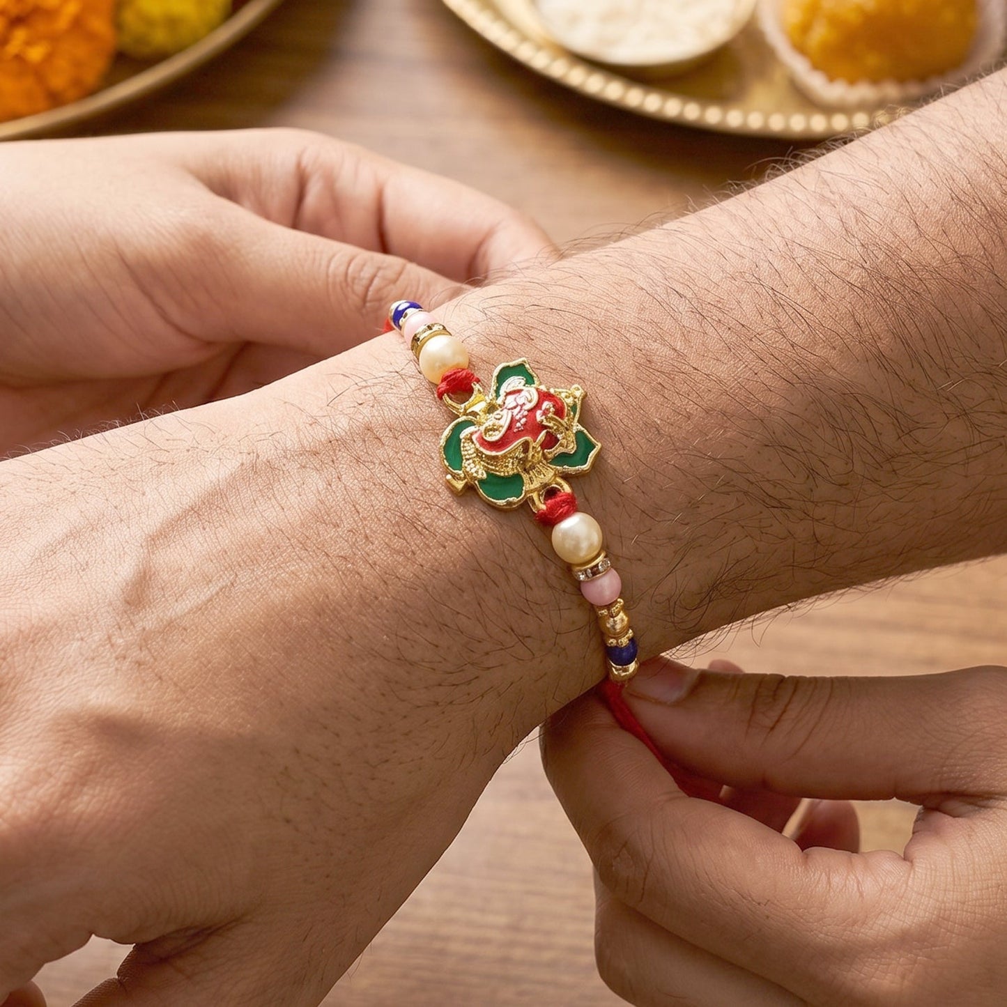 Top view of Floral Peacock Bhabhi Rakhi with intricate bead work