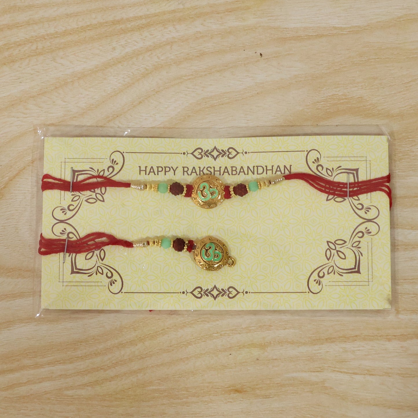 Swirl Coin Bhabhi Rakhi displayed with intricate pearl work